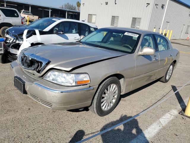 LINCOLN TOWN CAR E 2004 with VIN 1LNHM81W04Y614350 - Photo from auction