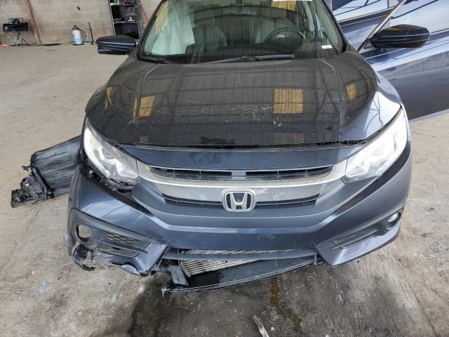 Photo 11 from auction – 2017 HONDA CIVIC EXL with VIN 19XFC1F71HE025150