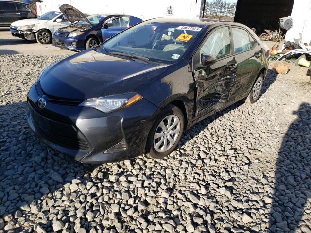 TOYOTA COROLLA L 2019 with VIN 2T1BURHE1KC218345 - Photo from auction
