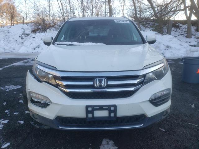 Photo 5 from auction – 2017 HONDA PILOT TOUR with VIN 5FNYF6H99HB504759