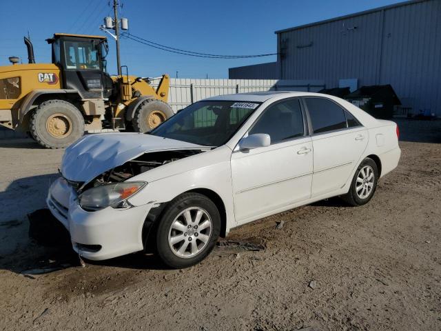 TOYOTA CAMRY LE 2004 with VIN 4T1BE32K64U375248 - Photo from auction