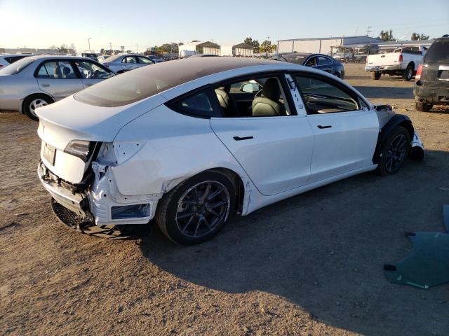 Photo 3 from auction – 2021 TESLA MODEL 3 with VIN 5YJ3E1EA5MF016580