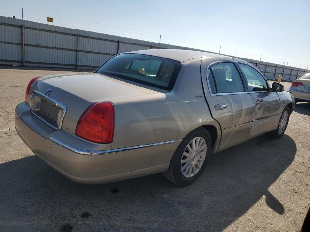Photo 3 from auction – 2004 LINCOLN TOWN CAR E with VIN 1LNHM81W04Y614350