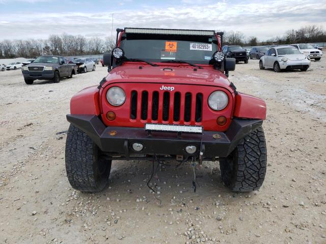 Photo 5 from auction – 2011 JEEP WRANGLER U with VIN 1J4BA5H19BL636573