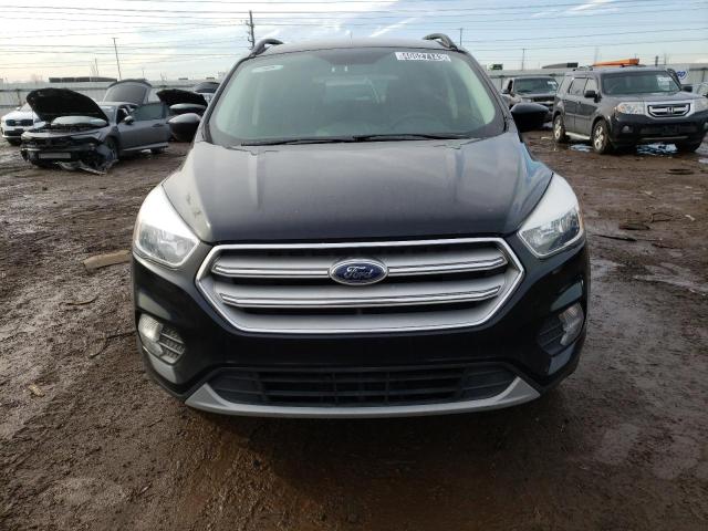 Photo 5 from auction – 2018 FORD ESCAPE SE with VIN 1FMCU9GD9JUB52346