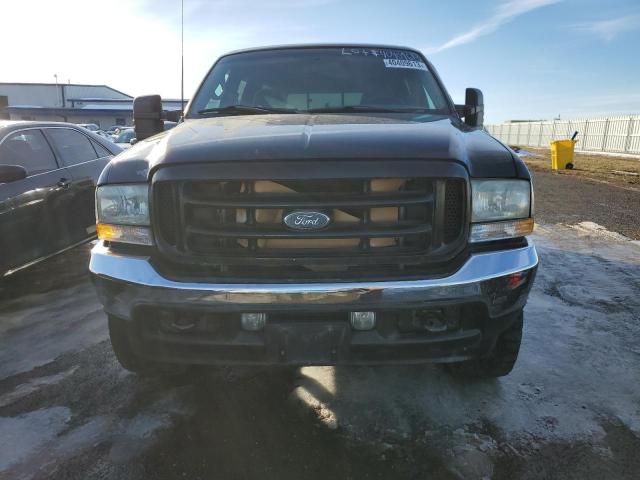 Photo 5 from auction – 2002 FORD F250 SUPER with VIN 1FTNW21L02ED32518