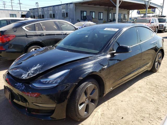 TESLA MODEL 3 2021 with VIN 5YJ3E1EA2MF943018 - Photo from auction