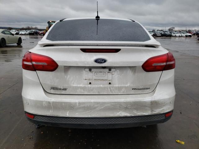 Photo 6 from auction – 2017 FORD FOCUS TITA with VIN 1FADP3J29HL324613