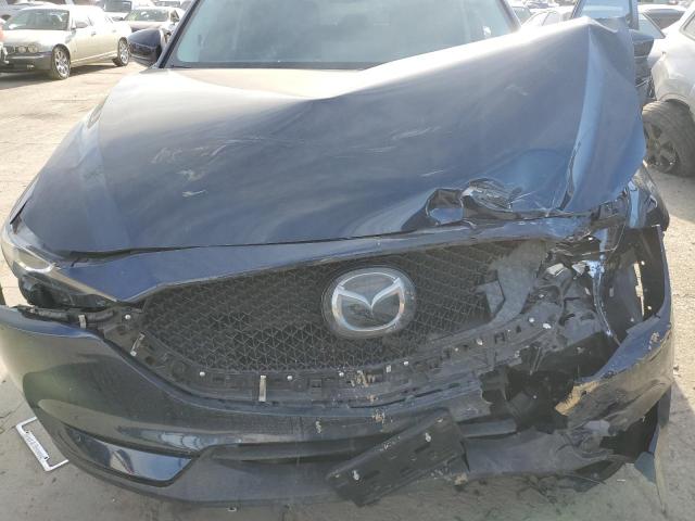 Photo 12 from auction – 2021 MAZDA CX-5 TOURI with VIN JM3KFBCMXM0415843