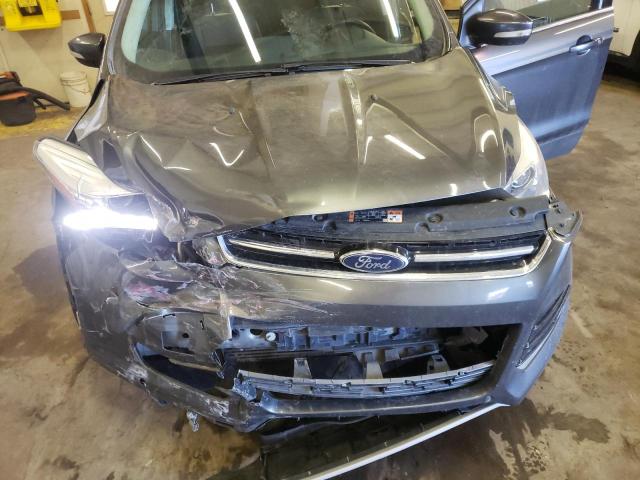 Photo 12 from auction – 2016 FORD ESCAPE TIT with VIN 1FMCU9J90GUA65058