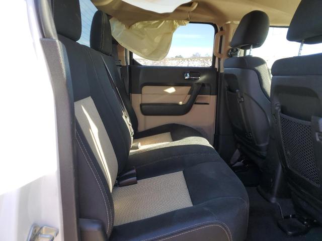 Photo 10 from auction – 2009 HUMMER H3T ALPHA with VIN 5GNEN13L898128990