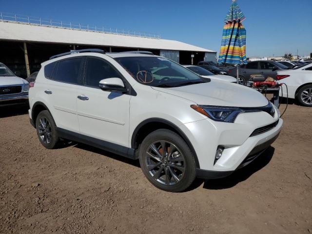 Photo 4 from auction – 2018 TOYOTA RAV4 LIMIT with VIN JTMDFREV2JJ228697