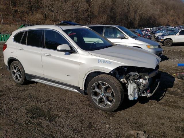 Photo 4 from auction – 2016 BMW X1 XDRIVE2 with VIN WBXHT3C35G5E47492