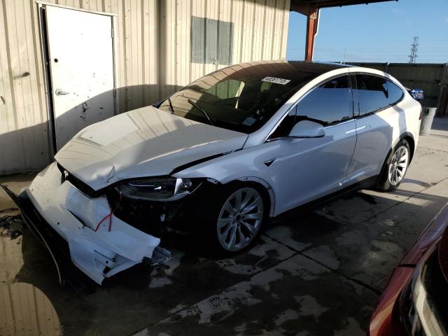 TESLA MODEL X 2017 with VIN 5YJXCDE29HF077423 - Photo from auction