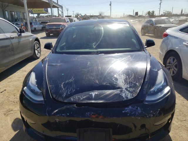 Photo 5 from auction – 2021 TESLA MODEL 3 with VIN 5YJ3E1EA2MF943018
