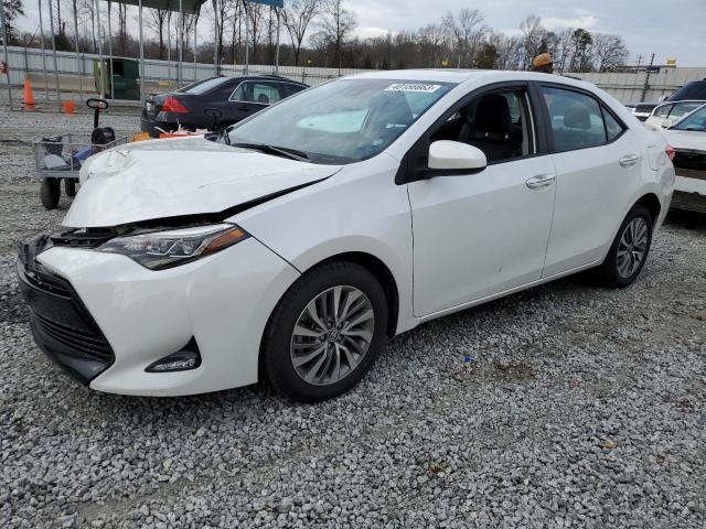 TOYOTA COROLLA L 2017 with VIN 5YFBURHE1HP634940 - Photo from auction