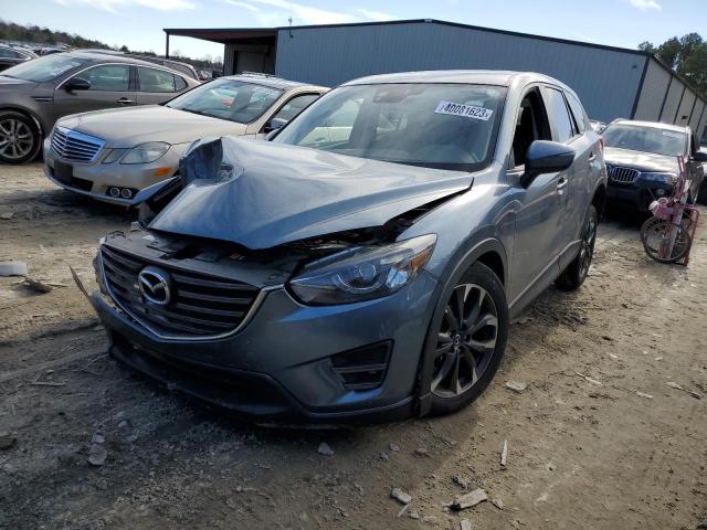 MAZDA CX-5 GT 2016 with VIN JM3KE4DY3G0683945 - Photo from auction