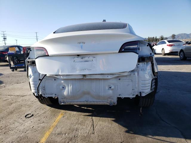 Photo 12 from auction – 2021 TESLA MODEL 3 with VIN 5YJ3E1EA8MF873797