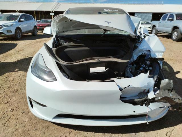 Photo 5 from auction – 2022 TESLA MODEL Y with VIN 7SAYGDEF4NF390177