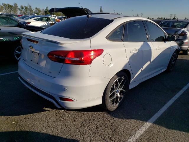 Photo 3 from auction – 2015 FORD FOCUS SE with VIN 1FADP3F20FL385905