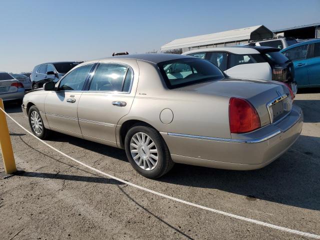 Photo 2 from auction – 2004 LINCOLN TOWN CAR E with VIN 1LNHM81W04Y614350