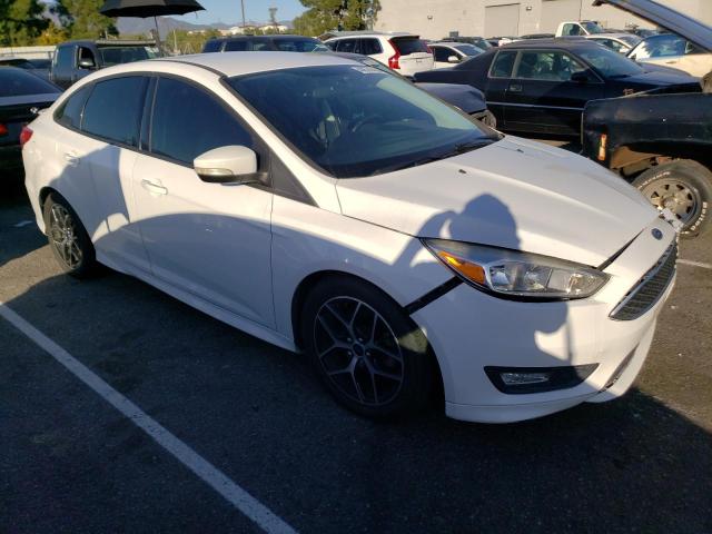 Photo 4 from auction – 2015 FORD FOCUS SE with VIN 1FADP3F20FL385905