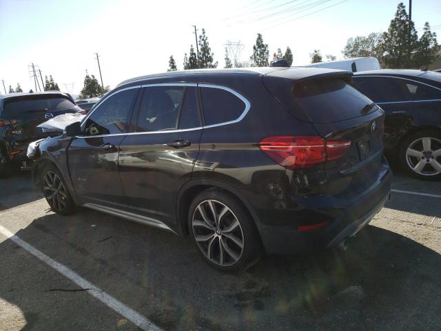 Photo 2 from auction – 2016 BMW X1 XDRIVE2 with VIN WBXHT3C3XG5F65540