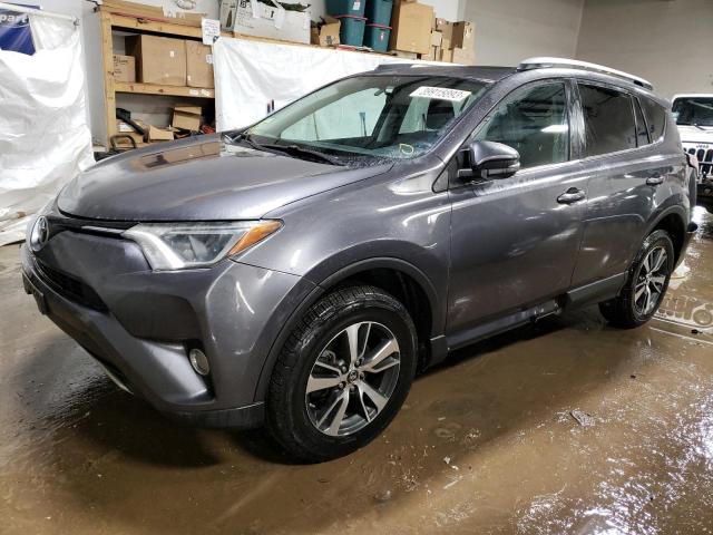 TOYOTA RAV4 XLE 2016 with VIN 2T3RFREV7GW419810 - Photo from auction