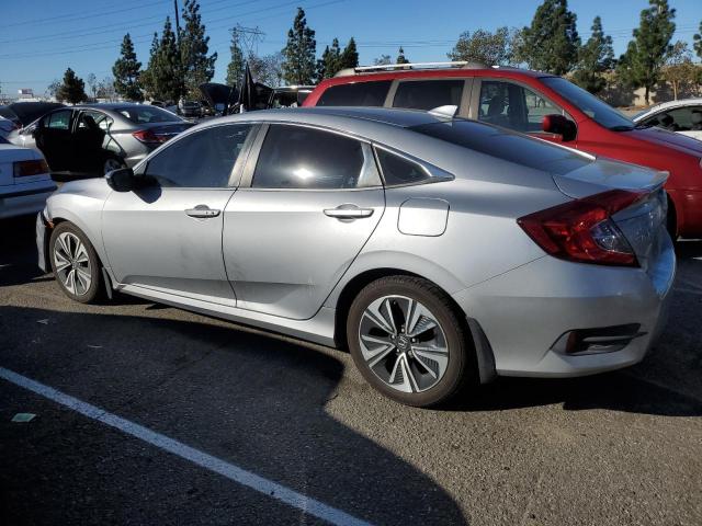Photo 2 from auction – 2016 HONDA CIVIC EX with VIN 2HGFC1F3XGH659266