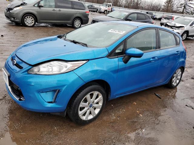 FORD FIESTA SE 2012 with VIN 3FADP4EJ3CM117505 - Photo from auction