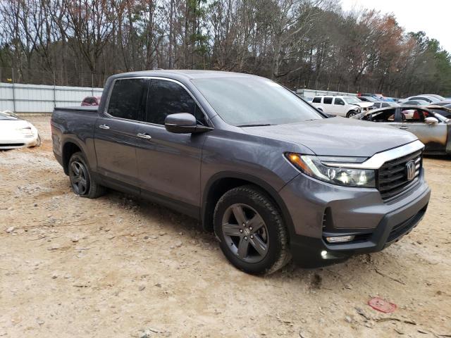 Photo 4 from auction – 2021 HONDA RIDGELINE with VIN 5FPYK3F75MB025042