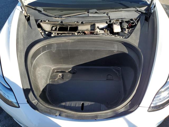 Photo 11 from auction – 2018 TESLA MODEL 3 with VIN 5YJ3E1EA6JF017393