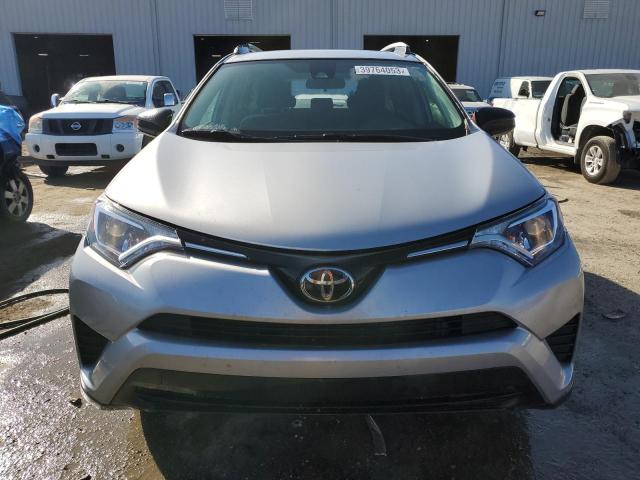 Photo 5 from auction – 2018 TOYOTA RAV4 LE with VIN 2T3ZFREV8JW493356