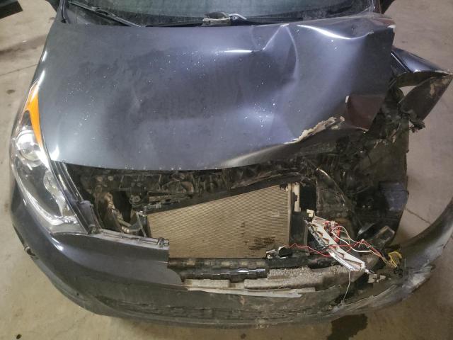 Photo 11 from auction – 2013 KIA RIO EX with VIN KNADN5A34D6885571