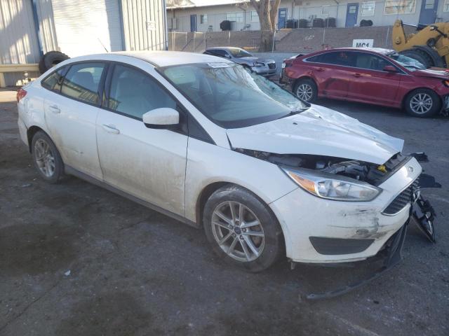 Photo 4 from auction – 2018 FORD FOCUS SE with VIN 1FADP3F24JL325036