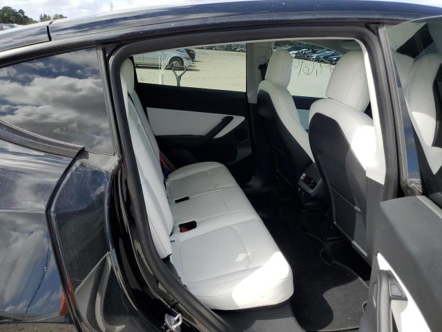Photo 11 from auction – 2021 TESLA MODEL Y with VIN 5YJYGDEF2MF134549