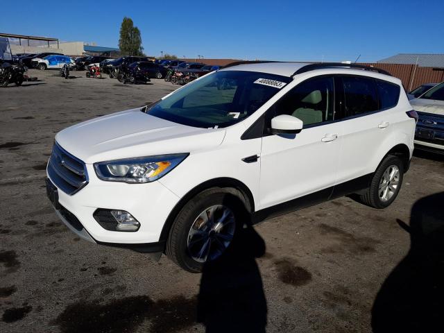 FORD ESCAPE SE 2017 with VIN 1FMCU9GD0HUD67673 - Photo from auction