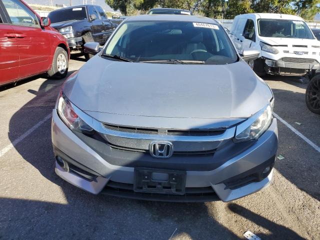 Photo 5 from auction – 2016 HONDA CIVIC EX with VIN 2HGFC1F3XGH659266