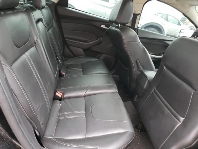 Photo 10 from auction – 2013 FORD FOCUS SE with VIN 1FADP3F29DL354312
