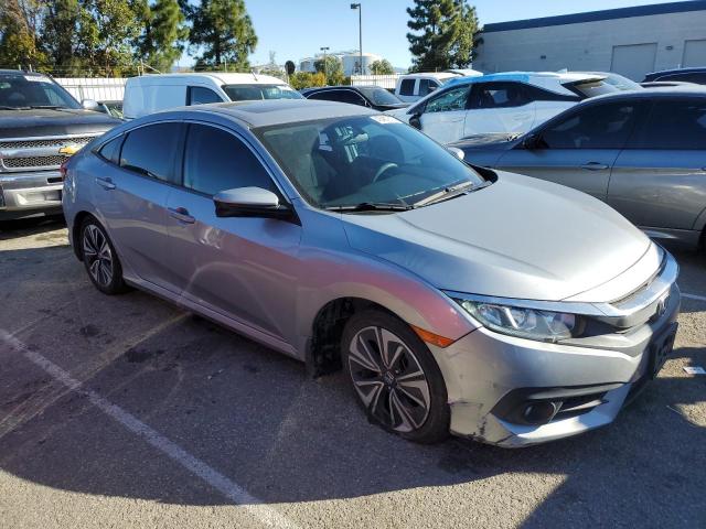 Photo 4 from auction – 2016 HONDA CIVIC EX with VIN 2HGFC1F3XGH659266