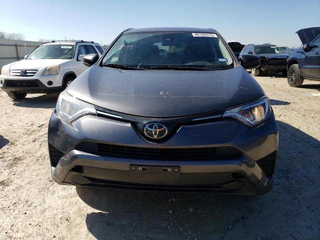 Photo 5 from auction – 2018 TOYOTA RAV4 LE with VIN JTMZFREV7JD122914