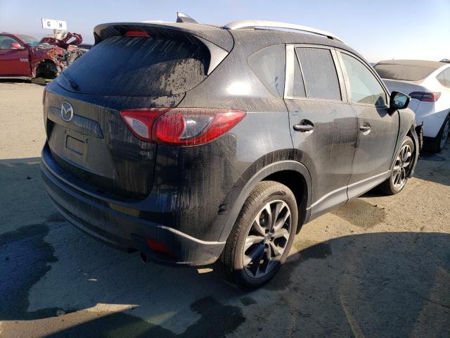 Photo 3 from auction – 2016 MAZDA CX-5 GT with VIN JM3KE2DY9G0786193