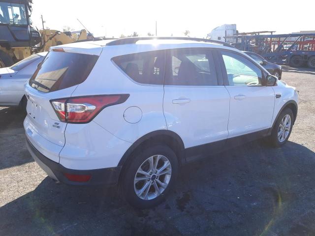 Photo 3 from auction – 2017 FORD ESCAPE SE with VIN 1FMCU9GD0HUD67673