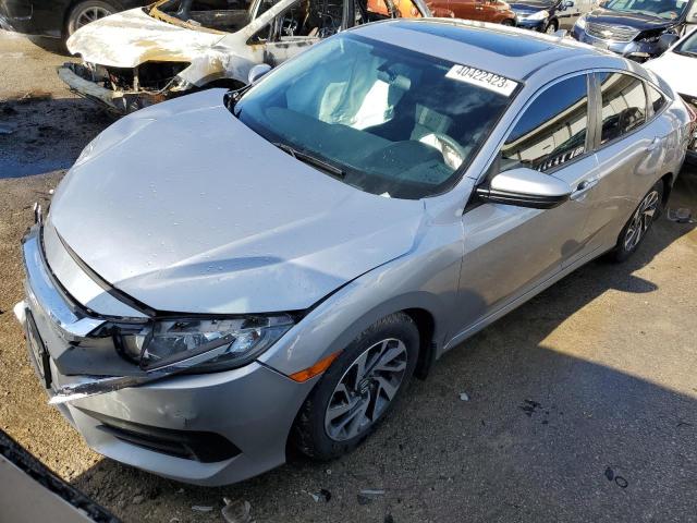 HONDA CIVIC EX 2018 with VIN 2HGFC2F72JH551370 - Photo from auction
