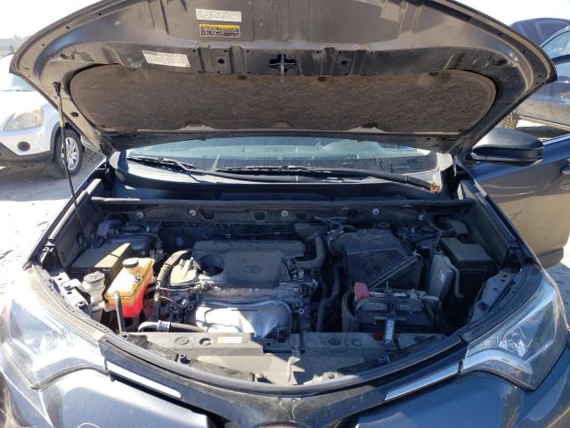 Photo 12 from auction – 2018 TOYOTA RAV4 LE with VIN JTMZFREV7JD122914