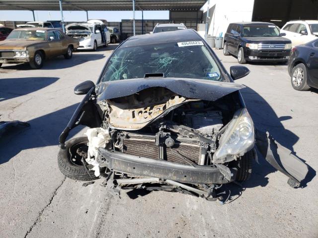 Photo 5 from auction – 2014 TOYOTA PRIUS C with VIN JTDKDTB3XE1569445