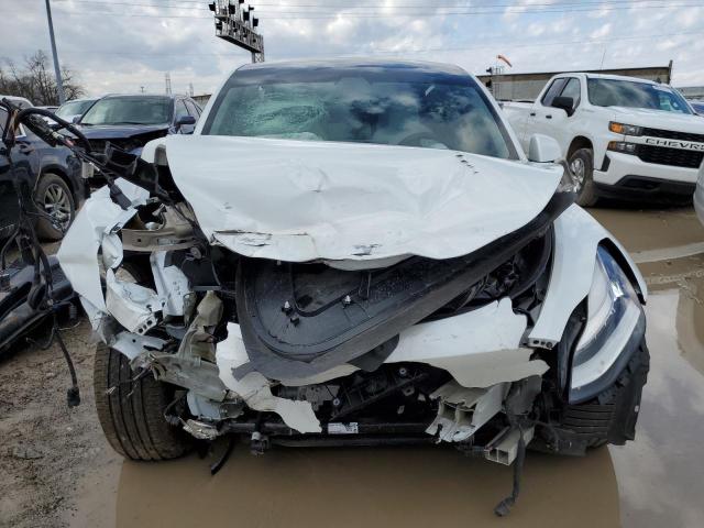 Photo 5 from auction – 2021 TESLA MODEL Y with VIN 5YJYGDEE9MF071134