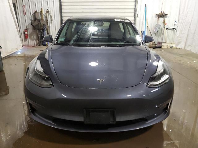 Photo 5 from auction – 2022 TESLA MODEL 3 with VIN 5YJ3E1EBXNF289329