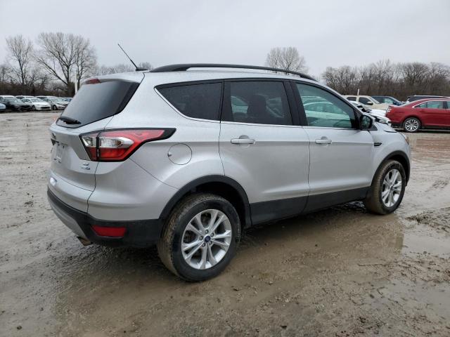 Photo 3 from auction – 2018 FORD ESCAPE SE with VIN 1FMCU9GD9JUD42051