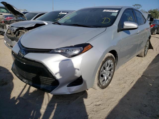 TOYOTA COROLLA L 2019 with VIN 2T1BURHE5KC157498 - Photo from auction